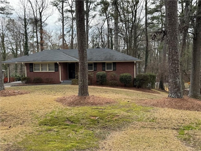 1376 Woodbine St, Marietta, GA 30062 - ranch-style house with brick siding, a front yard, and a carport