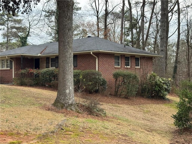 1376 Woodbine St, Marietta, GA 30062 - view of side of property with brick siding and a yard