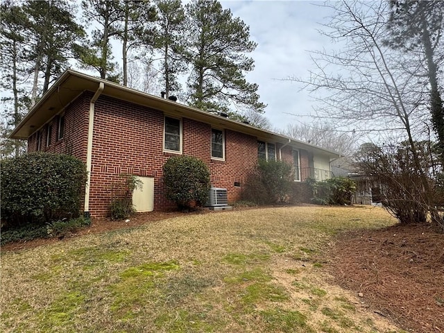 1376 Woodbine St, Marietta, GA 30062 - view of property exterior with brick siding, cooling unit, and a lawn