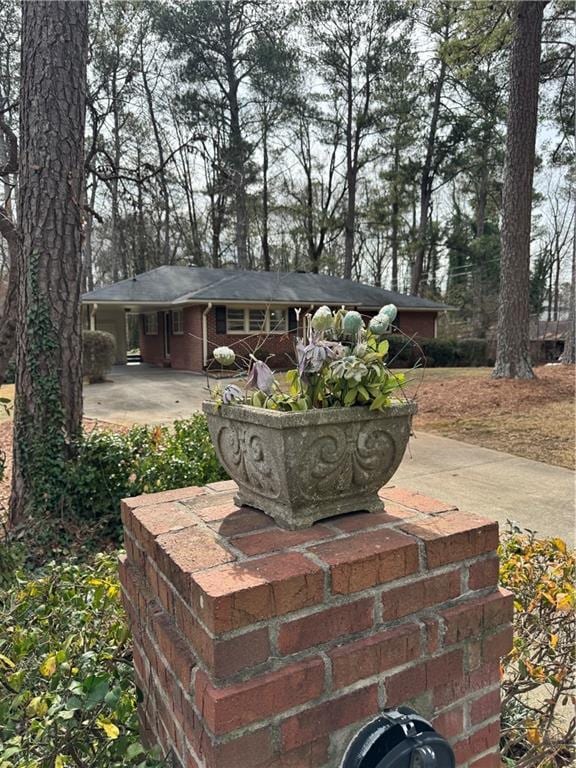 1376 Woodbine St, Marietta, GA 30062 - view of front of property featuring an attached carport and a patio area