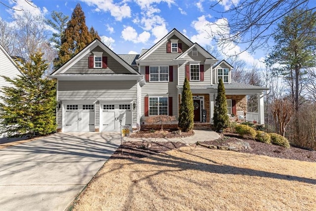 craftsman-style house with driveway