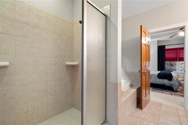 bathroom with ceiling fan, separate shower and tub, and tile patterned flooring