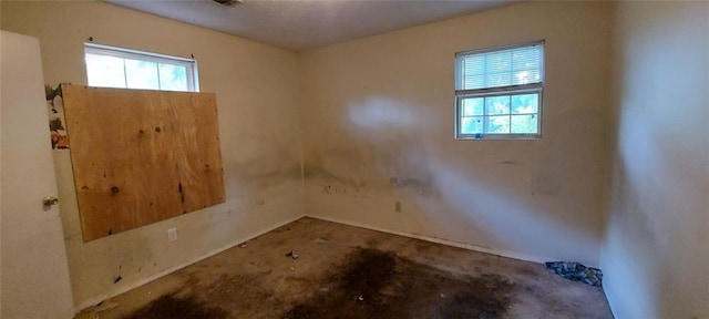 spare room featuring plenty of natural light