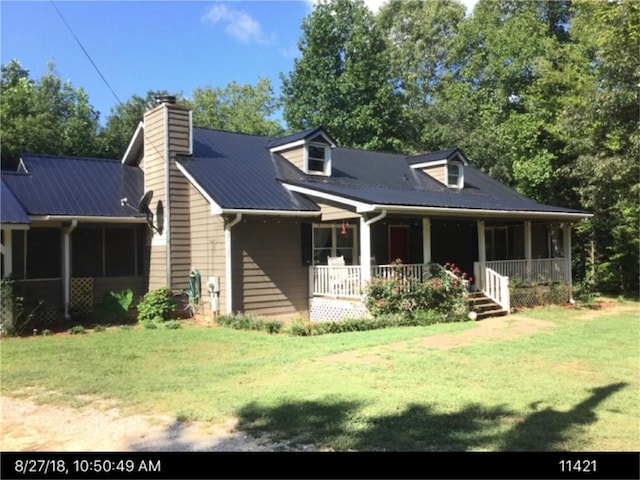 view of front of home featuring a front yard and a porch