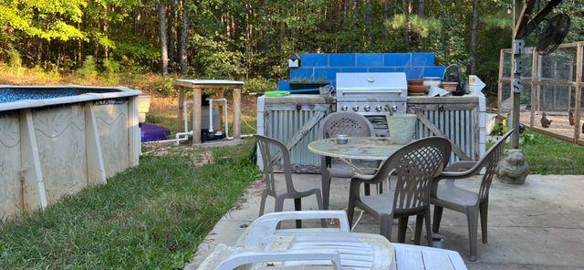 view of patio / terrace featuring area for grilling and exterior kitchen