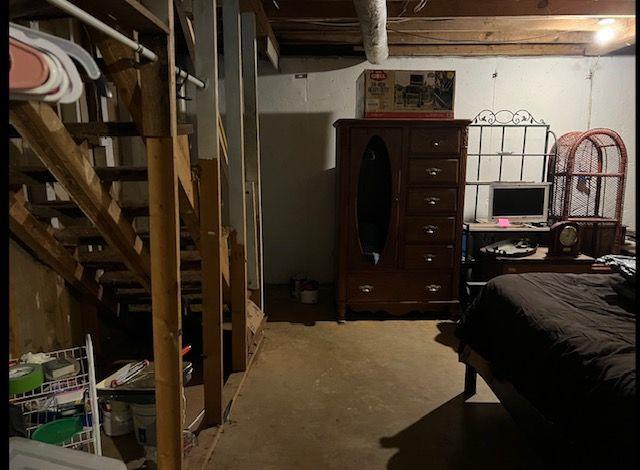 bedroom with concrete flooring