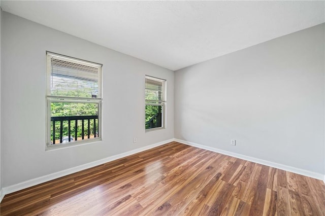 717 Beaufort Cir, Duluth, GA 30096 - empty room featuring baseboards and wood finished floors
