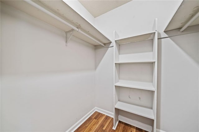 717 Beaufort Cir, Duluth, GA 30096 - walk in closet with wood finished floors