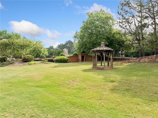 717 Beaufort Cir, Duluth, GA 30096 - view of yard with a gazebo and view of wooded area