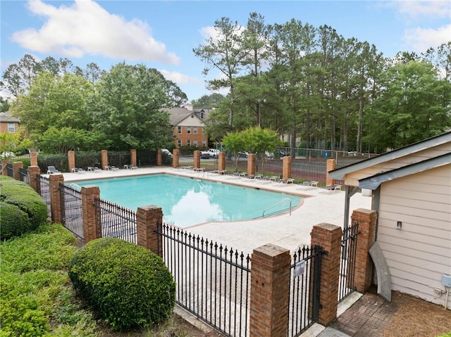 717 Beaufort Cir, Duluth, GA 30096 - community pool with a patio area