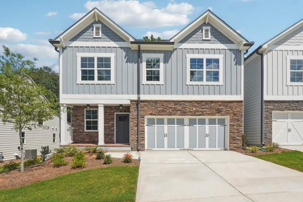 craftsman inspired home featuring a garage