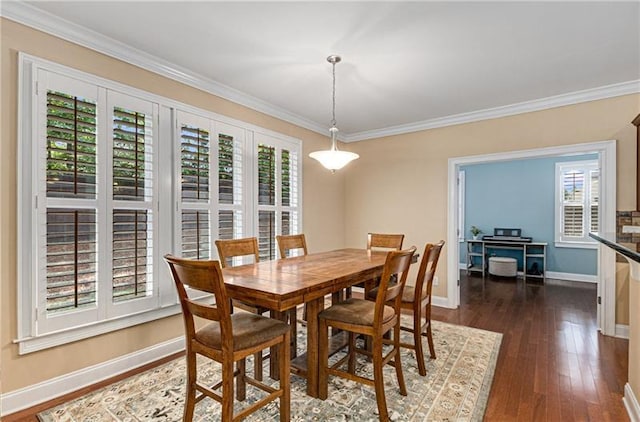 1725 Lynwood Pl, Alpharetta, GA 30004 - dining space featuring healthy amount of natural light, ornamental molding, baseboards, and dark wood-type flooring