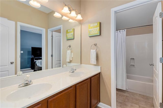 1725 Lynwood Pl, Alpharetta, GA 30004 - bathroom featuring connected bathroom, double vanity, shower / tub combo, tile patterned floors, and baseboards