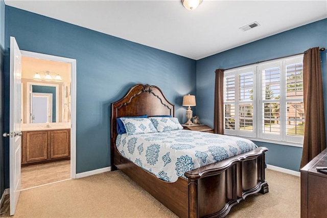 1725 Lynwood Pl, Alpharetta, GA 30004 - bedroom with light carpet, baseboards, and ensuite bath