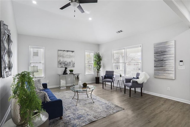 living area featuring visible vents, baseboards, wood finished floors, recessed lighting, and a ceiling fan
