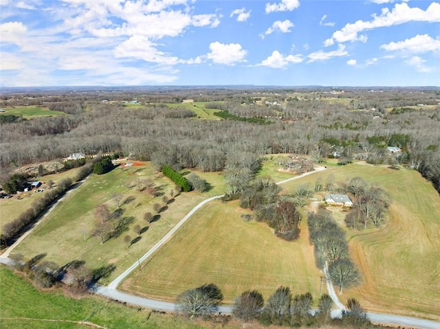 birds eye view of property featuring a rural view