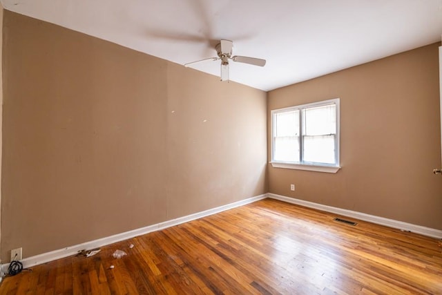 unfurnished room featuring wood-type flooring and ceiling fan