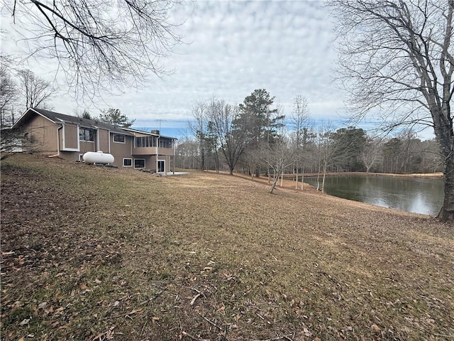 view of yard with a water view