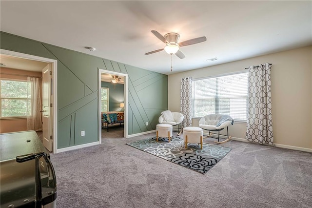 3291 Wild Basil Ln, Buford, GA 30519 - living area featuring a ceiling fan, plenty of natural light, and carpet flooring