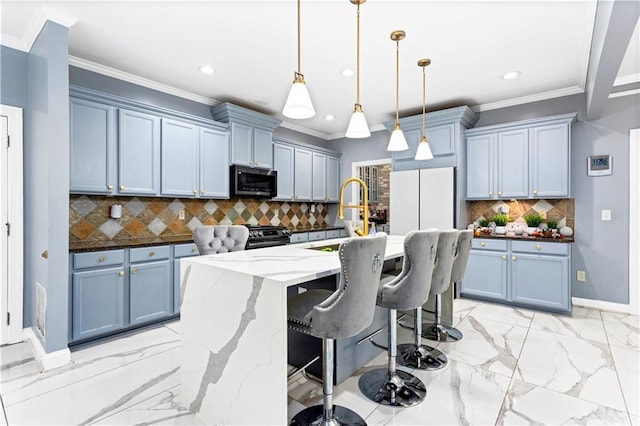 kitchen featuring sink, dark stone counters, hanging light fixtures, ornamental molding, and stainless steel appliances