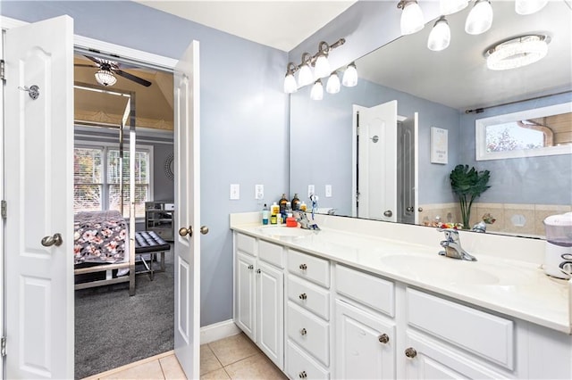 bathroom featuring tile patterned flooring and vanity