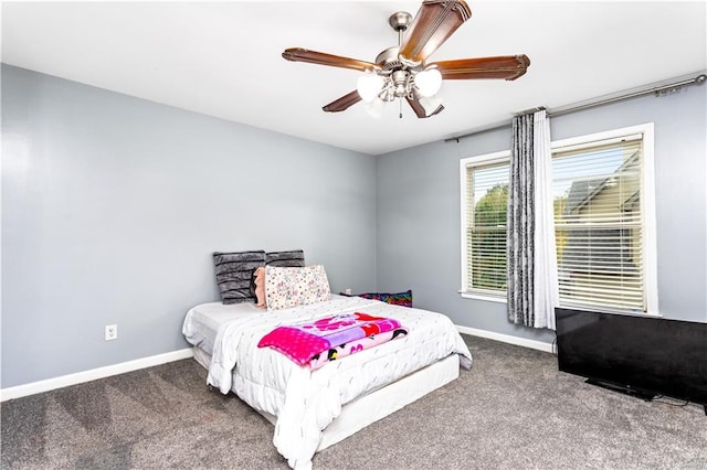 bedroom with ceiling fan and carpet