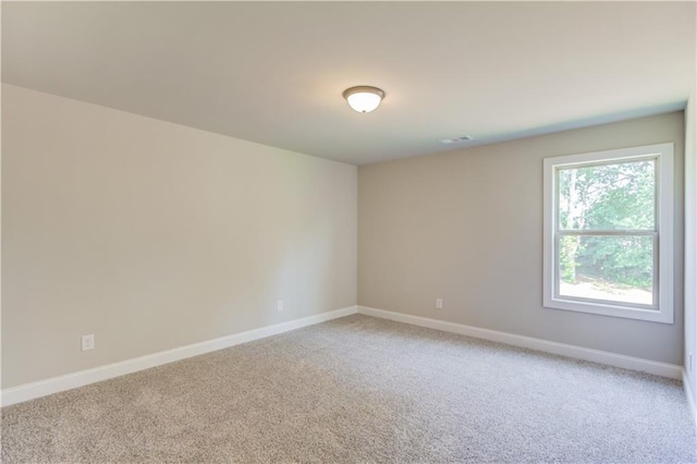 view of carpeted spare room