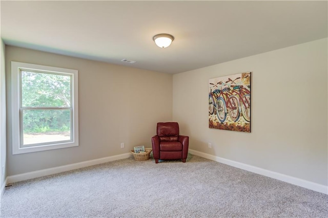 unfurnished room featuring carpet floors