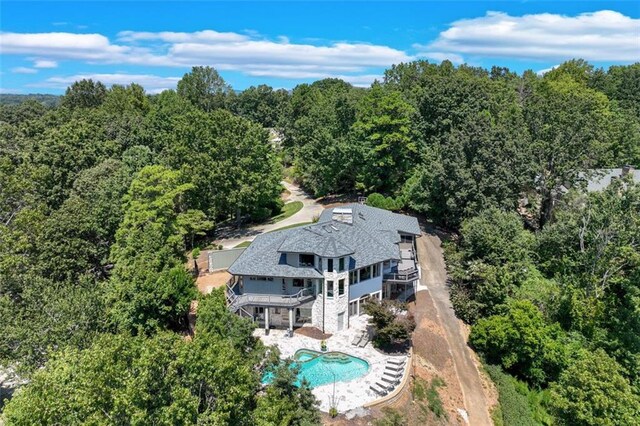 2935 Thompson Mill Rd, Gainesville, GA 30506 - view of subject property featuring a pool and a heavily wooded area