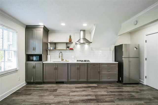 700 Hill Meadow Dr, Dacula, GA 30019 - kitchen with gray cabinets, a sink, appliances with stainless steel finishes, wall chimney range hood, and backsplash