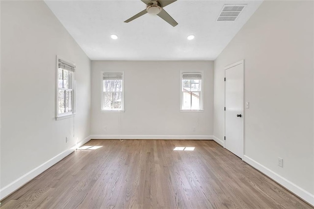 700 Hill Meadow Dr, Dacula, GA 30019 - spare room with wood finished floors, baseboards, visible vents, and ceiling fan