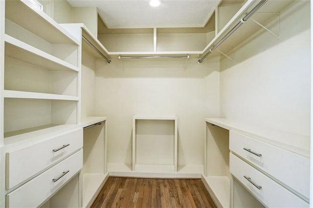700 Hill Meadow Dr, Dacula, GA 30019 - spacious closet featuring dark wood-type flooring