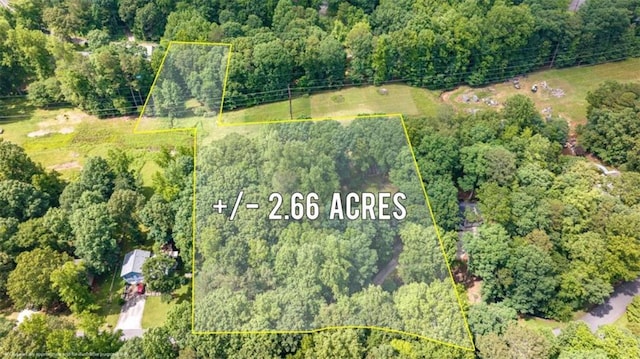 1526 Oakleaf Dr, Auburn, GA 30011 - aerial view of property's location with a forest and property boundaries highlighted