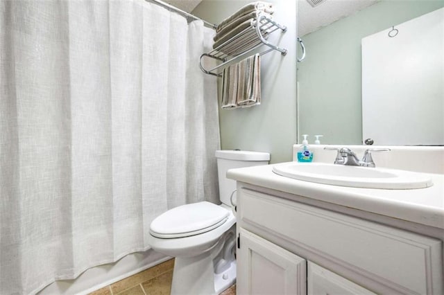 1526 Oakleaf Dr, Auburn, GA 30011 - full bath featuring vanity, toilet, and tile patterned flooring