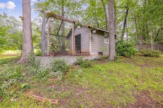1526 Oakleaf Dr, Auburn, GA 30011 - view of side of home with exterior structure, an outbuilding, and crawl space
