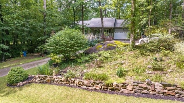 1526 Oakleaf Dr, Auburn, GA 30011 - view of front of house featuring a garage and asphalt driveway