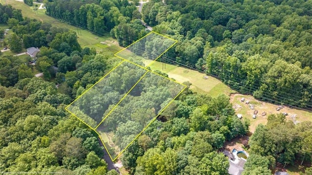 1526 Oakleaf Dr, Auburn, GA 30011 - aerial overview of property's location with property parcel outlined and a heavily wooded area