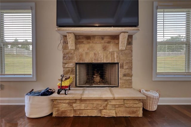 200 Baumgard, Locust Grove, GA 30248 - detailed view of wood finished floors and a stone fireplace