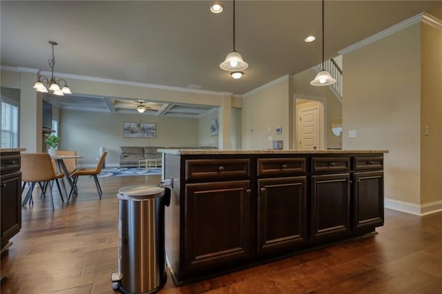 200 Baumgard, Locust Grove, GA 30248 - kitchen with dark wood-style flooring, crown molding, recessed lighting, a chandelier, and pendant lighting