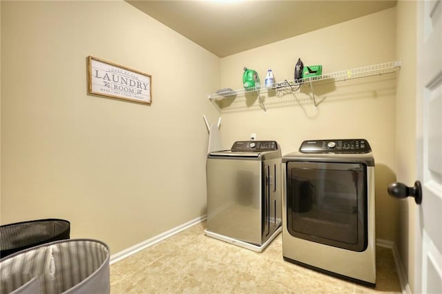 200 Baumgard, Locust Grove, GA 30248 - washroom featuring washer and clothes dryer and baseboards