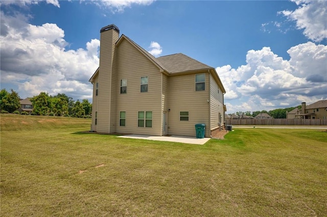 200 Baumgard, Locust Grove, GA 30248 - back of house with a patio and a chimney