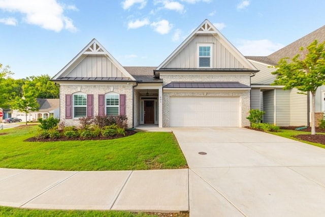 craftsman-style home featuring a garage and a front yard