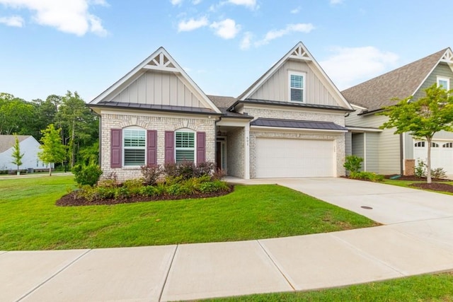 craftsman-style house featuring a garage and a front yard