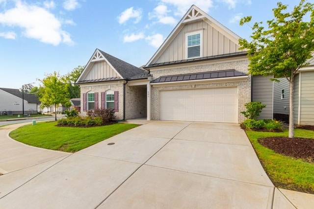 craftsman-style home with a garage and a front lawn