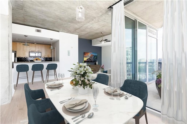 3324 Peachtree Rd NE Unit 2518, Atlanta, GA 30326 - dining space featuring light wood-type flooring and ceiling fan