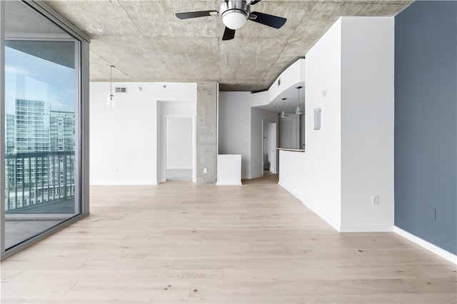 3324 Peachtree Rd NE Unit 2518, Atlanta, GA 30326 - empty room featuring light wood-style flooring and a ceiling fan