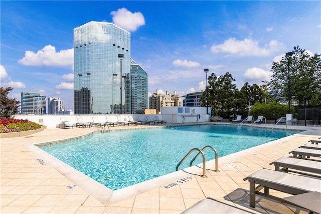 3324 Peachtree Rd NE Unit 2518, Atlanta, GA 30326 - community pool featuring a patio and a view of city