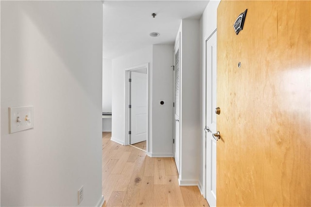 3324 Peachtree Rd NE Unit 2518, Atlanta, GA 30326 - hallway featuring light wood-style floors and baseboards