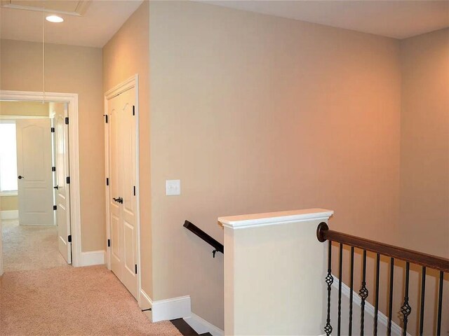 1035 Willow Field Ln SE, Marietta, GA 30067 - hallway featuring attic access, baseboards, recessed lighting, carpet, and an upstairs landing