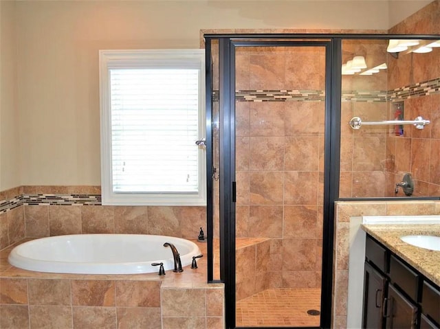 1035 Willow Field Ln SE, Marietta, GA 30067 - full bathroom featuring a garden tub, vanity, and a stall shower